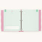 An open three-ring binder planner or notebook showing pastel mint green interior pages with pink patterned side tabs and a silver metal ring closure.